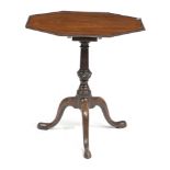 A GEORGE III MAHOGANY TRIPOD OCCASIONAL TABLE C.1760 the octagonal tilt-top on a turned stem with