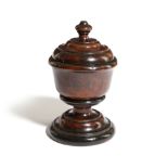 A TREEN YEW SALT OR SPICE POT AND COVER LATE 18TH / EARLY 19TH CENTURY with a moulded lid and on