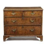 A WALNUT CHEST EARLY 18TH CENTURY ELEMENTS inlaid with stringing and parquetry banding, with two