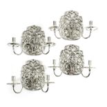 A SET OF FOUR SILVERED TWIN-LIGHT WALL LIGHTS IN 17TH CENTURY STYLE the wall plates cast with a