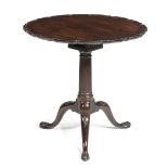 A GEORGE II MAHOGANY TRIPOD OCCASIONAL TABLE C.1755 the tilt-top with a pie crust moulded edge