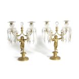 A PAIR OF REGENCY GILT METAL CANDELABRA EARLY 19TH CENTURY the pair of cut-glass sconces on