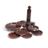 EIGHT MAHOGANY COASTERS MAINLY 19TH CENTURY including: a pair with string inlay to the rim, together