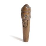 A TREEN PRIMITIVE FIGURAL LEVER ACTION NUTCRACKER PROBABLY 18TH CENTURY carved with the head of a