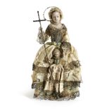 A WAX MOTHER AND CHILD DOLL GROUP POSSIBLY SPANISH, LATE 19TH CENTURY both standing, the mother with