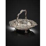 A George II silver swing-handled basket, by Philip Garden, London 1750, oval form, pierced with