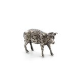 A silver model of a lamb, maker's mark WI over HS, London 1927, modelled in a standing position,