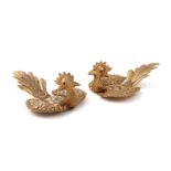 A pair of Chinese silver-gilt Phoenix birds, marked with Chinese characters, the hinged with