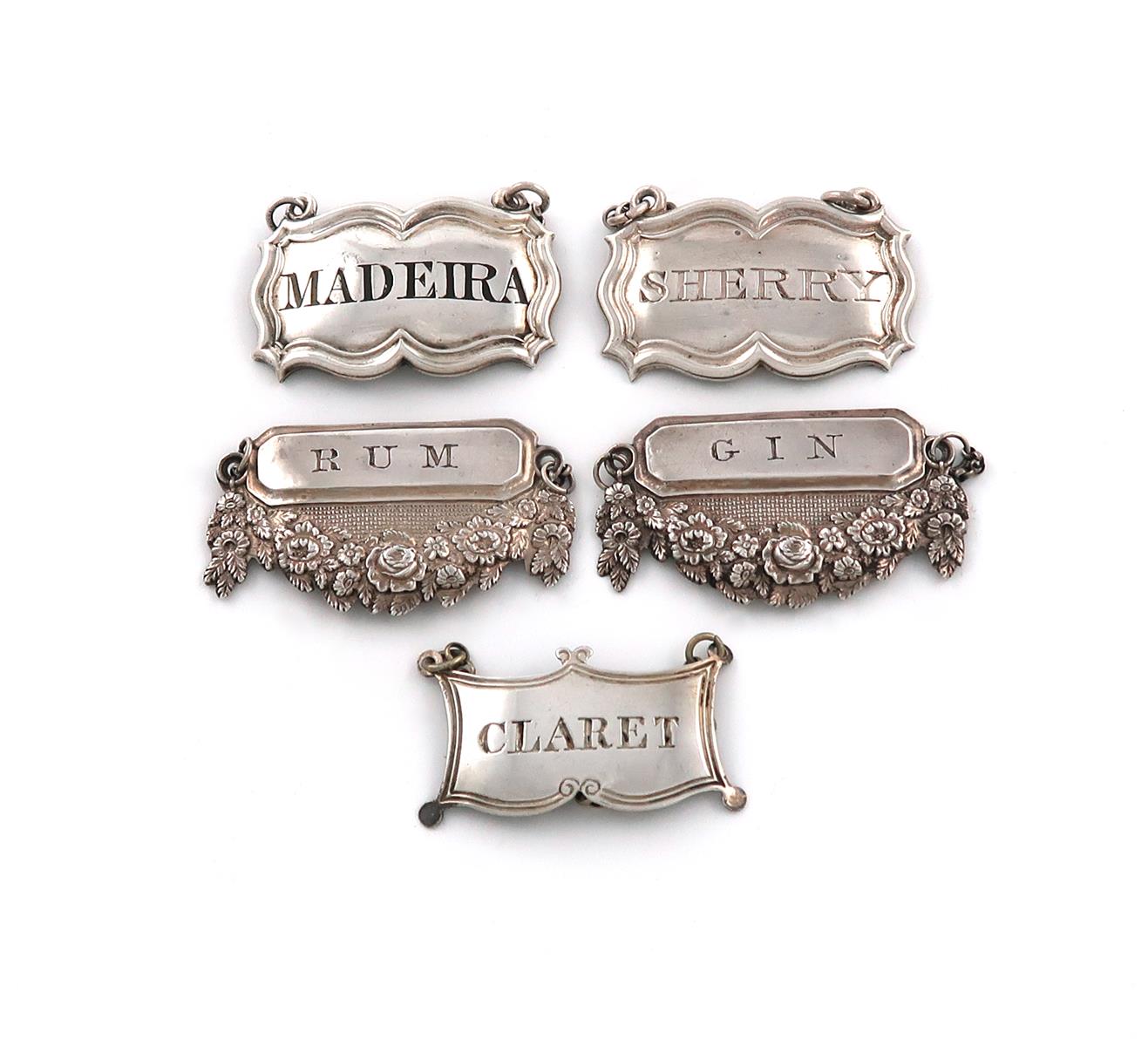 A collection of five antique silver wine labels, comprising: a pair by Francis Clark, Birmingham