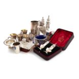 A mixed lot, comprising silver items: two George III pepper pots, a Portuguese mug, inscribed, two
