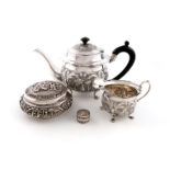 A mixed lot of metalware, comprising: an Indian teapot and cream jug, unmarked, circular bellied