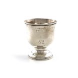 A George I silver tot cup, no apparent maker's mark, London 1724, baluster form, on a raised