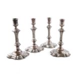 A set of four mid-18th century Irish candlesticks, by Robert Calderwood, Dublin circa 1750, lobed