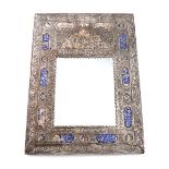 A Persian silver and enamel mirror, rectangular form, with panels of script on a blue enamel ground,