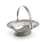 A late 19th century Dutch silver swing-handled basket, maker's mark of D and a star in a lozenge,
