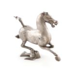 A modern silver model of the Flying Horse of Gansu, maker's mark of JW, London 1977, modelled in a