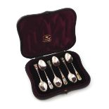 A set of six Victorian silver and enamel teaspoons, by George Jackson, London 1887, the handles with
