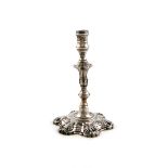 A George II silver taper stick, by James Cafe, London 1754, knopped stem, shell shoulders, spool-