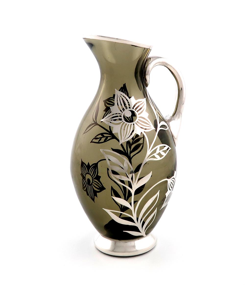 A German silver-overlay glass jug, by Friedrich Deusch, circa 1950, baluster form, scroll handle,