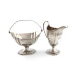 A George III silver swing-handled sugar basket and cream jug, by Solomon Hougham, London 1794,