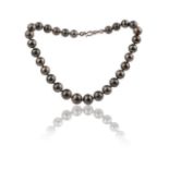 A black cultured pearl necklace, designed as a single row of black cultured pearls, diameters