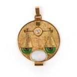An Italian gold, opal and diamond pendant, 1970s, designed as a textured medallion depicting the