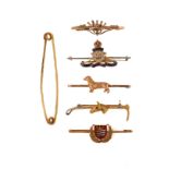 A group of six bar brooches, late 19th/early 20th century, including a regimental brooch with enamel