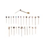 A group of 25 stick pins, of various designs, including five set with rubies; three set with