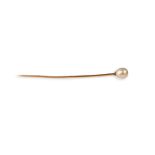 A natural pearl and diamond stick pin, set to one end with a natural pearl measuring approximately