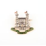 A Regimental brooch for the Loyal Suffolk Hussars, set with diamonds and enamel in platinum and