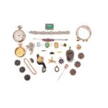 A mixed group of jewellery, comprising: a garnet bracelet; a hardstone cameo stick pin depicting