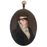 λFrench School 1816 Portrait miniature of a gentleman, wearing a black coat, yellow waistcoat and