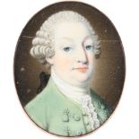 λFrench School 18th Century Portrait miniature of a gentleman wearing a green coat and waistcoat