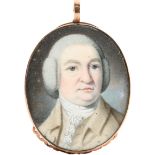 λAttributed to Richard Crosse (1742-1810) Portrait miniature of a gentleman, wearing a brown coat