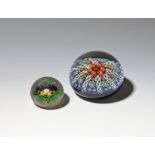 A miniature Baccarat paperweight c.1860-65, set with a specimen of heartsease or pansy, starcut