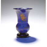 A blue glass vase c.1770, the thistle shape gilded in the London atelier of James Giles with small