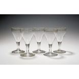 Five unusual acid-etched wine glasses for the Earl of Bristol early 19th century, the generous bowls