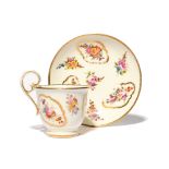 A Nantgarw cabinet cup and saucer c.1818-20, each piece painted, probably in London, with diagonally