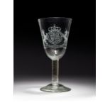 A large Williamite armorial goblet c.1740, the generous round funnel bowl engraved with the arms