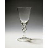 A façon de Venise wine glass or goblet late 17th/18th century, the rounded funnel bowl raised on a
