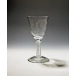 A large Jacobite goblet c.1760, the generous round funnel bowl engraved with a rose and thistle, the
