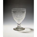A ceremonial glass or mixing rummer dated 1801, engraved in the manner of James Giles with the
