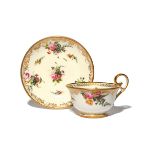 A Nantgarw cup and saucer c.1818-20, decorated probably in London with sprays of flowers on a