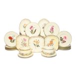 A Coalport botanical part dessert service c.1830, each piece finely painted with a floral specimen