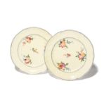 A pair of Nantgarw plates c.1818-20, London-decorated in the Sèvres manner with three sprays of