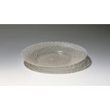 A Venetian latticino glass plate 19th century or earlier, decorated with a network of white canes,