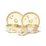 A Swansea trio and a cup and saucer c.1815-17, the trio comprising a coffee cup, teacup and