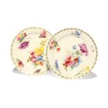A pair of Swansea plates c.1815-17, painted probably by Henry Morris with colourful floral posies