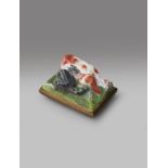 A rare Birmingham enamel 'combat' snuff box c.1765, of shaped rectangular form, the top moulded with