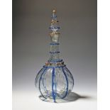 A Salviati decanter and stopper c.1900, the bottle form with honeycomb moulding rising to a spirally